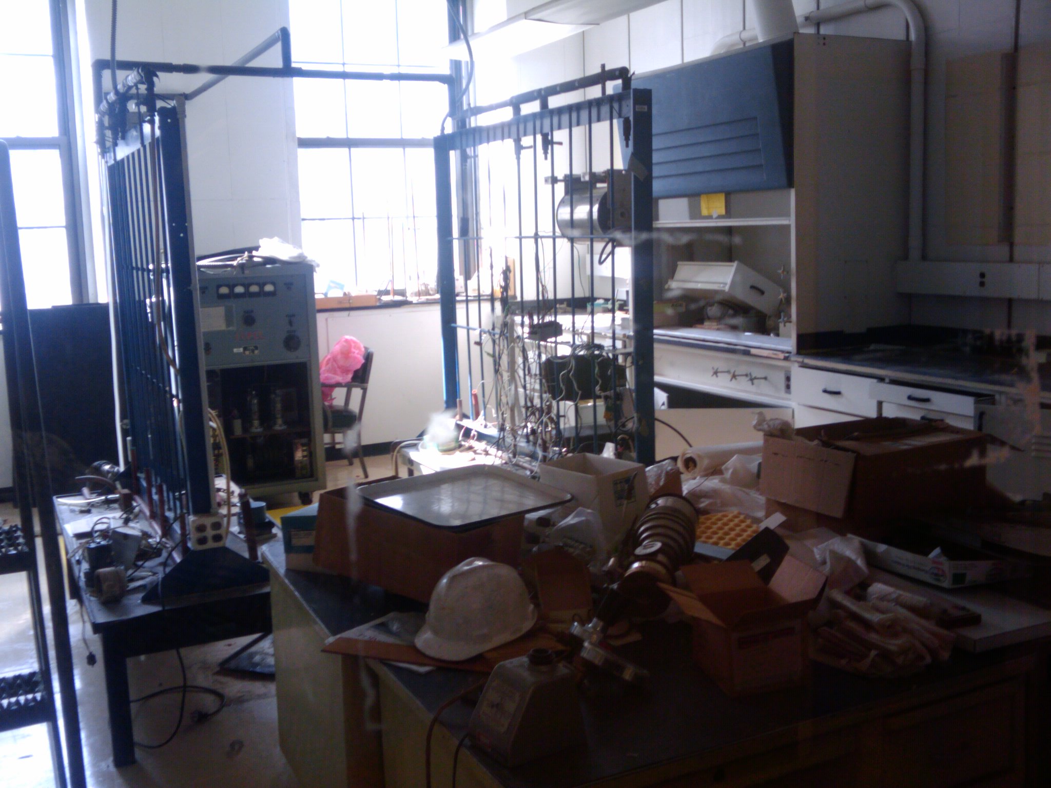 Emptied
                    out lab, vacuum support racks remaining